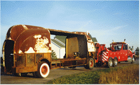 Tow Truck Hauls the Futurliner Off